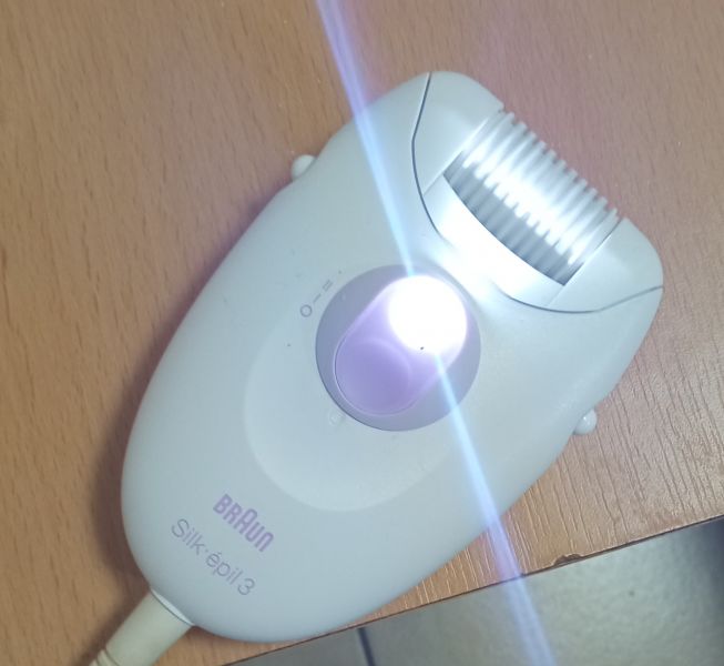 Vand Epilator BRAUN cu incarcator original ,de 12V 400mA
